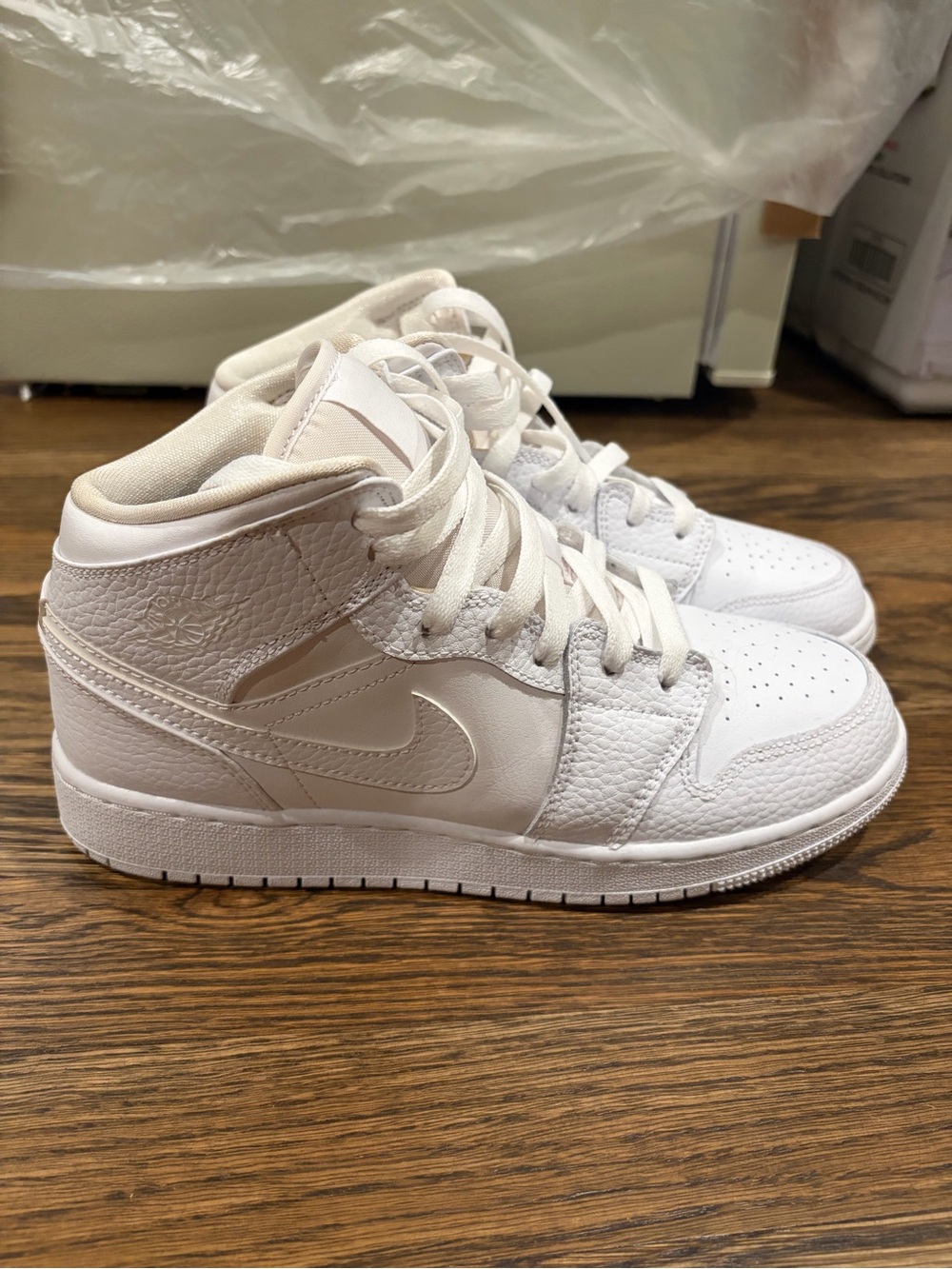 Nike Air Jordan 1's Women’s All-White Mid-Top Sneakers
